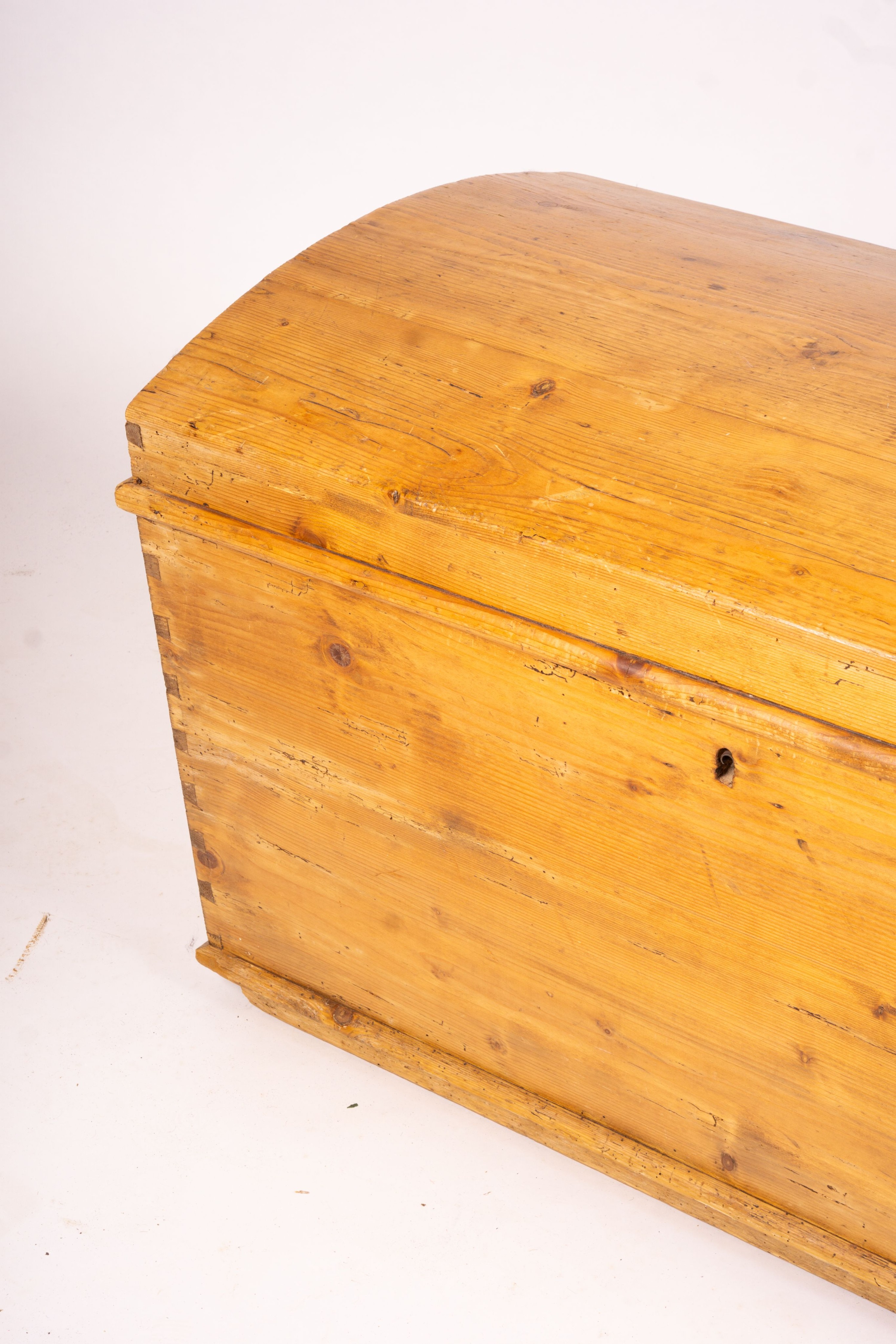 A 19th century Continental pine dome top trunk, length 98cm, width 54cm, height 58cm